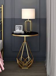 Table basse POCHY en métal luxueux disponible au Mali